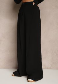 Renee - Czarne Spodnie Low Waist z Modalu z Szeroką Nogawką Reanelira. Okazja: na co dzień. Stan: obniżony. Kolor: czarny. Styl: klasyczny, casual, elegancki