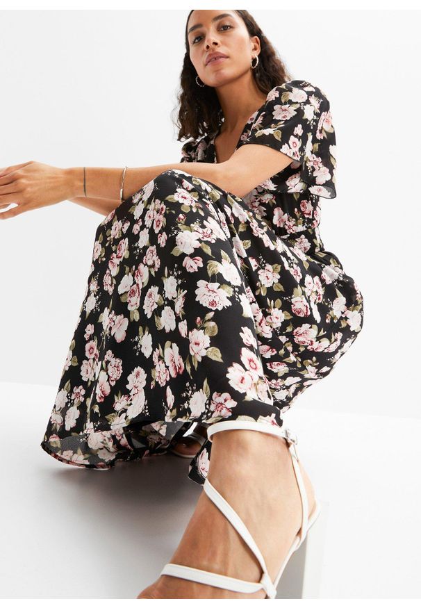 bonprix - Długa sukienka. Kolor: czarny. Wzór: nadruk, kwiaty. Długość: maxi