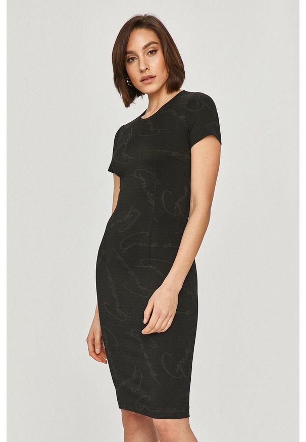 Guess - Sukienka. Kolor: czarny. Materiał: dzianina. Długość rękawa: krótki rękaw. Typ sukienki: dopasowane
