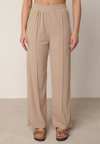 Born2be - Beżowe Szerokie Spodnie z Prążkowanej Tkaniny z Wysokim Stanem Sarora. Okazja: na co dzień. Stan: podwyższony. Kolor: beżowy. Materiał: tkanina, prążkowany. Wzór: prążki. Styl: casual #4