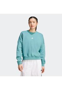 Adidas - Bluza damska ADIDAS Gym & Pilates. Kolor: niebieski. Materiał: włókno, bawełna. Sport: joga i pilates