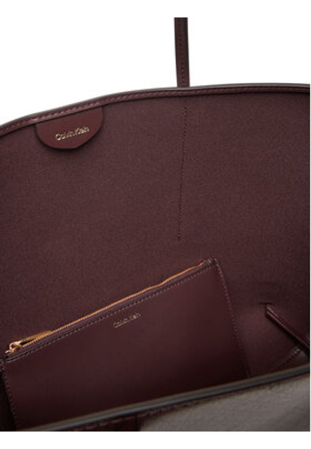 Calvin Klein Torebka Emblem Aop Tote W/ Pouch LV04F3266G Bordowy. Kolor: czerwony. Materiał: skórzane