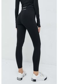 Juicy Couture legginsy Lorraine damskie kolor czarny gładkie. Kolor: czarny. Materiał: skóra, dzianina, materiał. Wzór: gładki #3