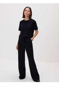 Reserved - Spodnie dresowe long leg - czarny. Kolor: czarny. Materiał: dresówka #1