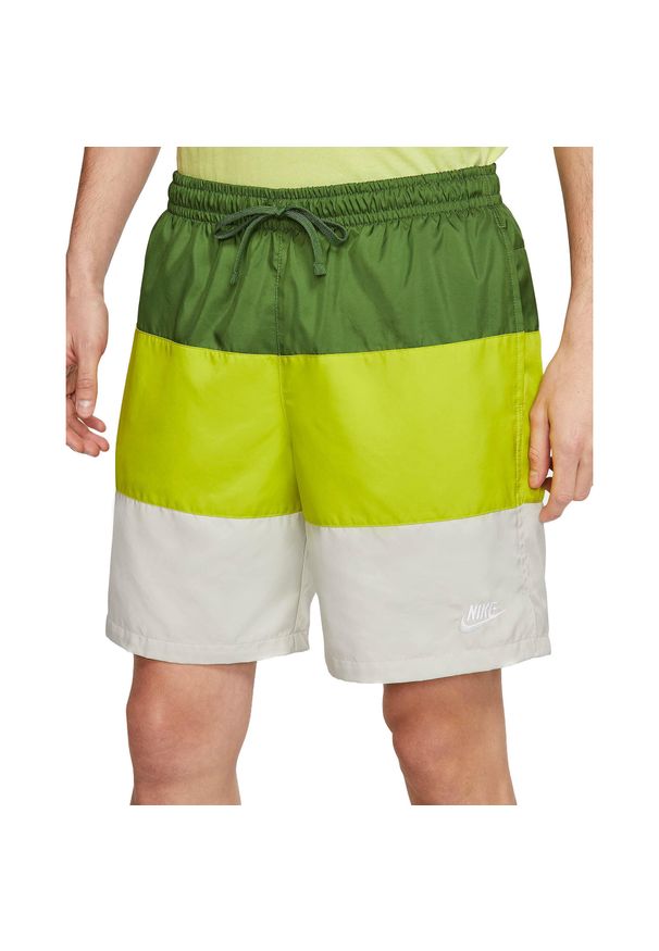 Spodenki Męskie Nike Sportswear City Edition Woven Shorts. Kolor: zielony. Długość: krótkie. Sezon: lato