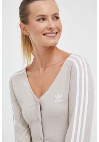 adidas Originals top damski kolor beżowy. Kolor: beżowy. Materiał: materiał, dzianina. Wzór: aplikacja #3