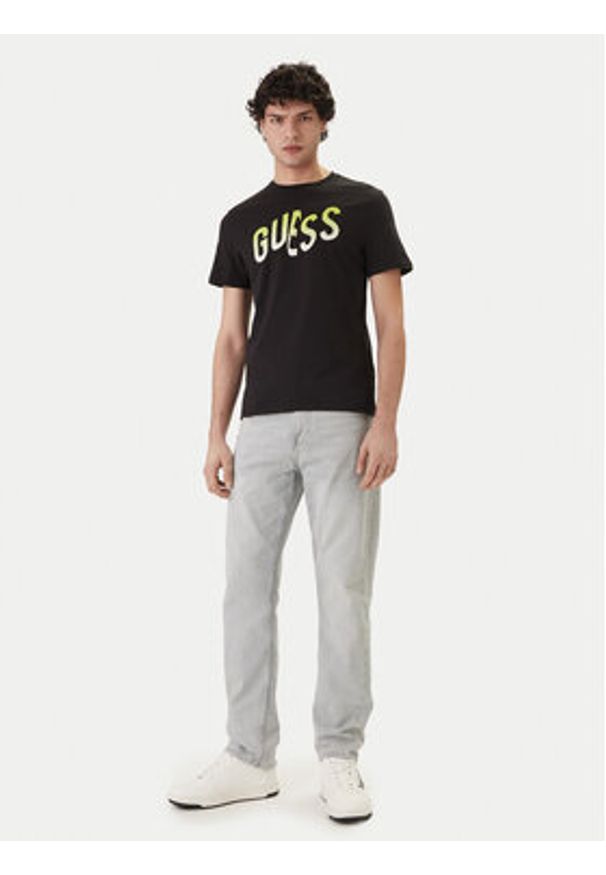 Guess T-Shirt F6GI02 J1314 Czarny Slim Fit. Kolor: czarny. Materiał: bawełna