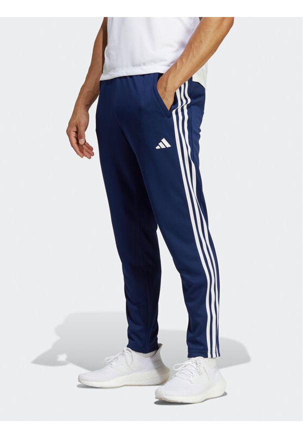 Adidas - Spodnie dresowe adidas. Kolor: niebieski. Materiał: dresówka, syntetyk