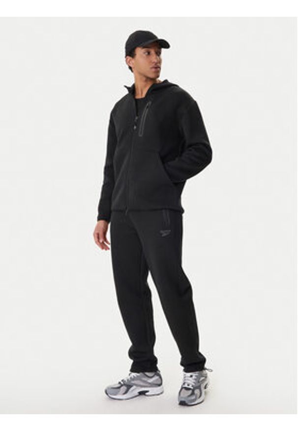 Reebok Spodnie dresowe Andrews RK25545CCM Czarny Regular Fit. Kolor: czarny. Materiał: bawełna