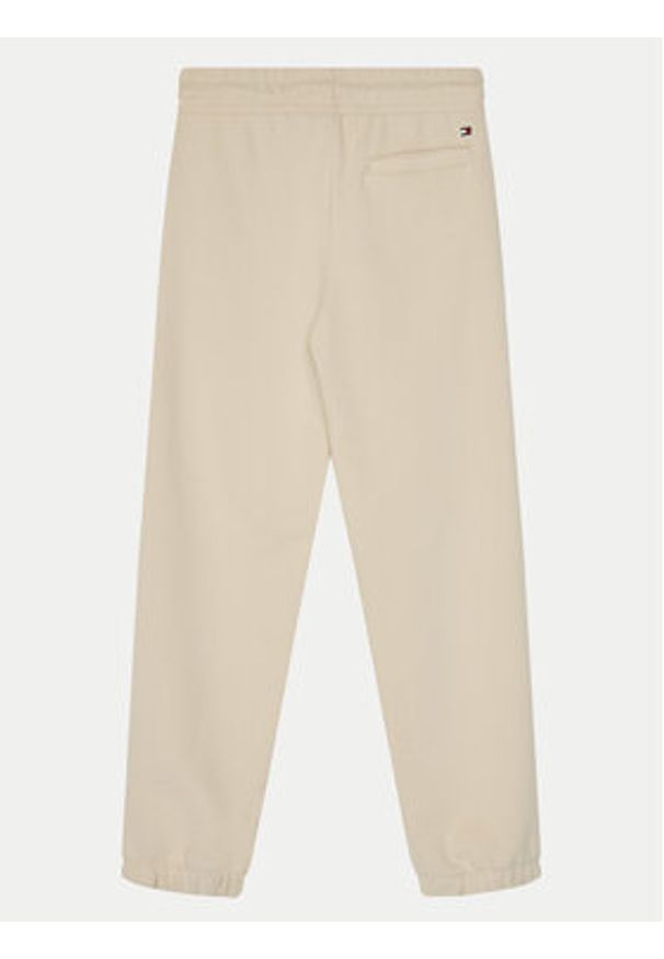 TOMMY HILFIGER - Tommy Hilfiger Spodnie dresowe KS0KS00596 Beżowy Regular Fit. Kolor: beżowy. Materiał: bawełna