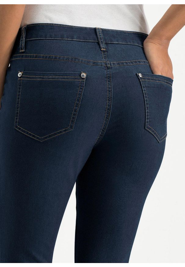 bonprix - Dżinsy Skinny mid waist. Kolor: niebieski