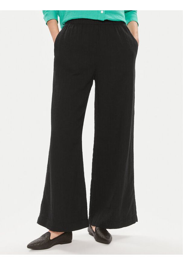 GAP - Gap Spodnie materiałowe 855967-00 Czarny Relaxed Fit. Kolor: czarny. Materiał: bawełna
