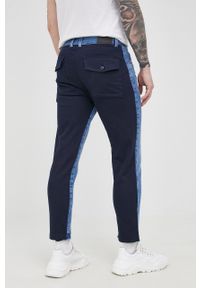 Desigual jeansy męskie. Kolor: niebieski