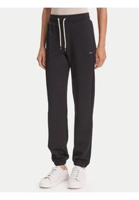 Guess Spodnie dresowe V5YB06 KBSL2 Czarny Regular Fit. Kolor: czarny. Materiał: syntetyk