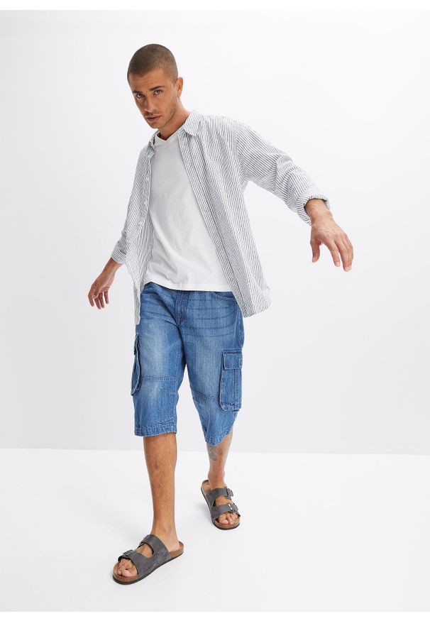 bonprix - Długie bermudy dżinsowe Relaxed Fit. Kolor: niebieski. Długość: długie
