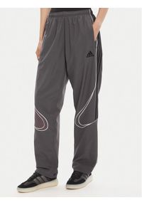 Adidas - adidas Spodnie dresowe Teamgeist adicolor JW5870 Szary Loose Fit. Kolor: szary. Materiał: syntetyk