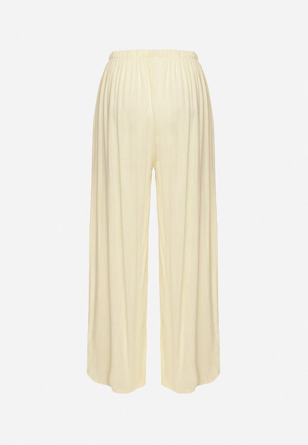 Born2be - Jasnożółte Spodnie z Szerokimi Nogawkami i Gumką w Pasie Helnena. Okazja: na co dzień, na spacer. Kolor: żółty. Materiał: wiskoza, materiał. Styl: klasyczny, casual