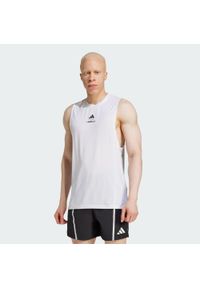 Adidas - Koszulka Les Mills Graphic Tank. Kolor: biały. Długość rękawa: bez rękawów. Technologia: ClimaCool (Adidas). Sport: fitness
