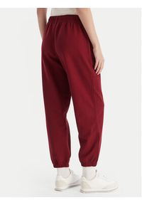 Calvin Klein Jeans Spodnie dresowe Monologo LV047B235G Bordowy Regular Fit. Kolor: czerwony. Materiał: bawełna #4