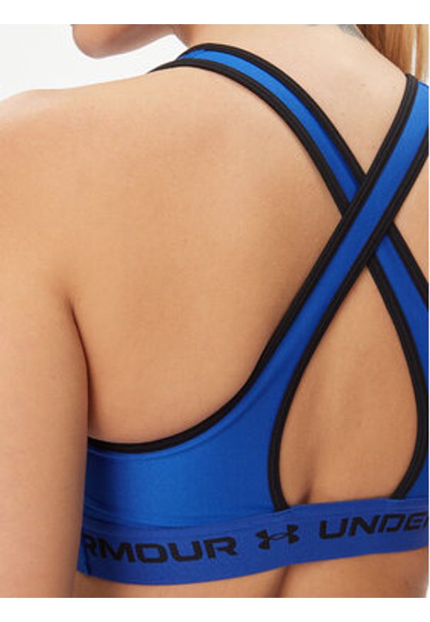 Under Armour Biustonosz sportowy Ua Crossback Mid Bra 1361034 Niebieski Compression Fit. Kolor: niebieski. Materiał: syntetyk