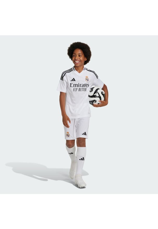 Adidas - Szorty Real Madrid 24/25 Home Kids. Kolor: biały. Materiał: materiał. Sport: piłka nożna