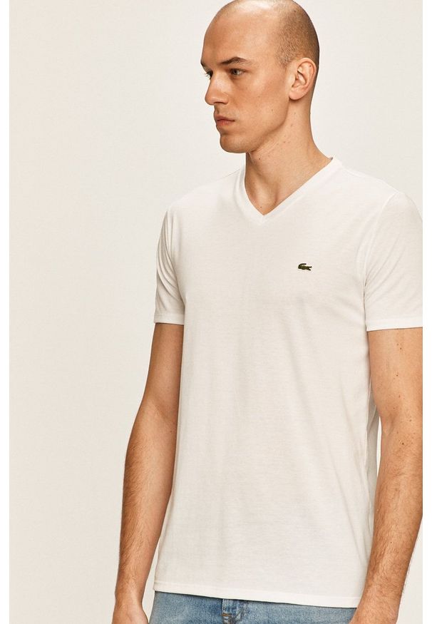Lacoste - T-shirt. Okazja: na co dzień. Kolor: biały. Materiał: dzianina. Wzór: gładki. Styl: casual