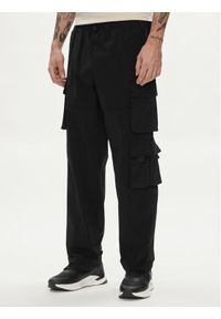 Jack & Jones - Jack&Jones Spodnie materiałowe Karl 12253626 Czarny Loose Fit. Kolor: czarny. Materiał: syntetyk #1