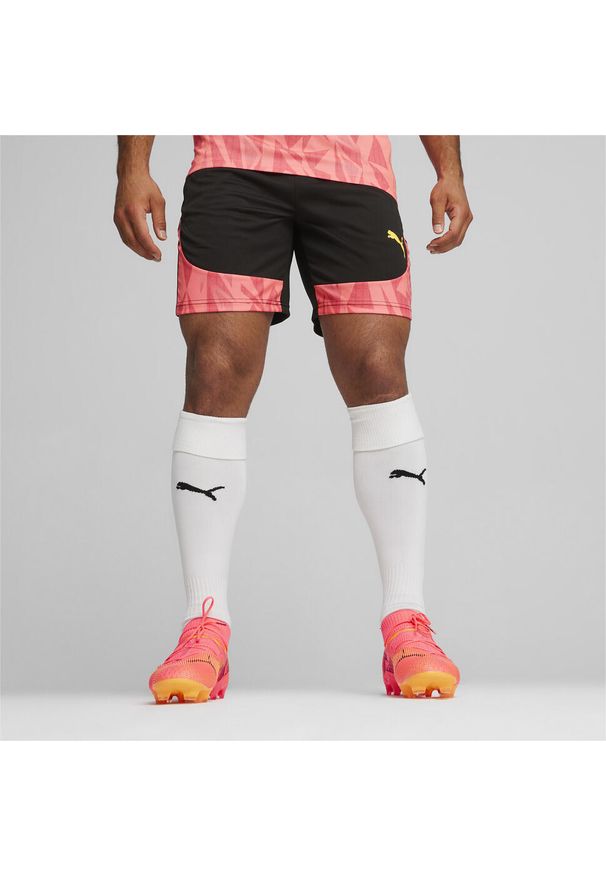 Puma - Męskie spodenki piłkarskie individualFINAL PUMA Black Sun Stream Orange. Kolor: wielokolorowy, pomarańczowy, czarny. Wzór: nadruk. Sport: piłka nożna