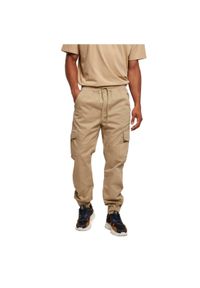 Spodnie do biegania Urban Classics Military. Kolor: beżowy. Długość: długie. Wzór: moro. Sport: bieganie #1