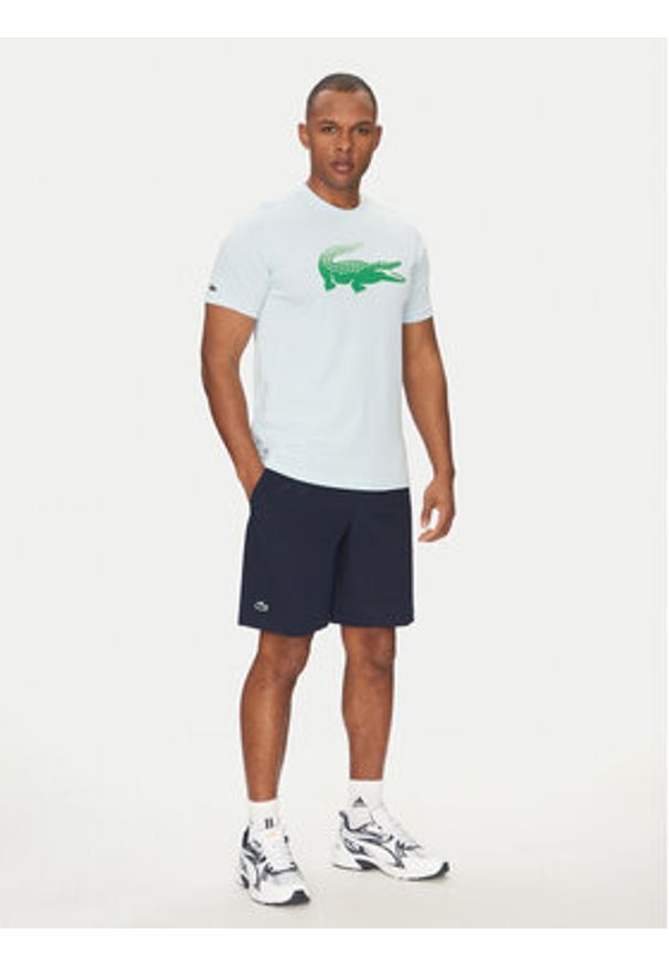 Lacoste T-Shirt TH8970 Błękitny Regular Fit. Kolor: niebieski. Materiał: bawełna