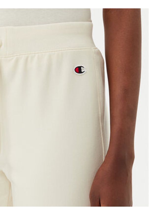 Champion Spodnie dresowe 118101 Écru Slim Fit. Materiał: bawełna