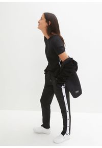 bonprix - Spodnie dresowe z napami, szybko schnące. Kolor: czarny. Materiał: dresówka. Styl: sportowy