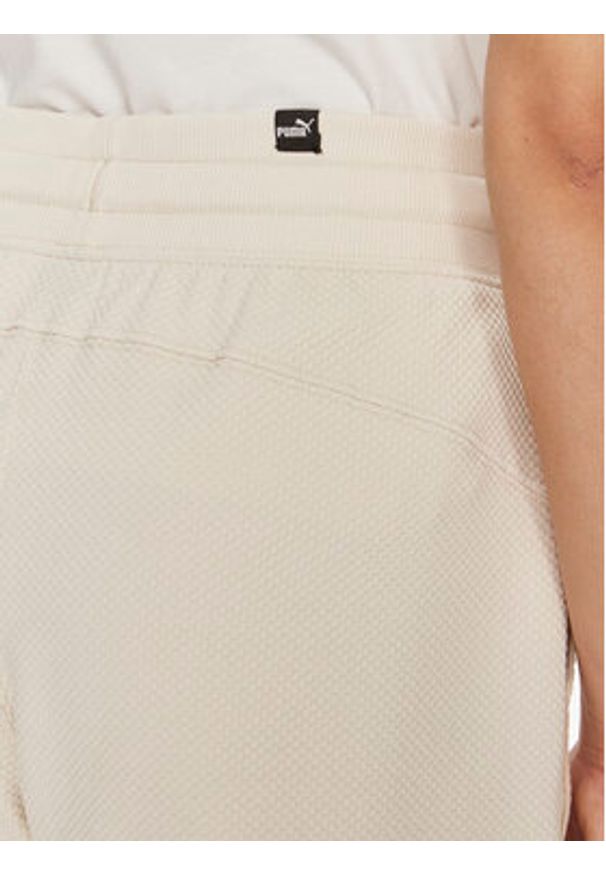 Puma Szorty sportowe HER 678701 Écru Regular Fit. Materiał: syntetyk, bawełna
