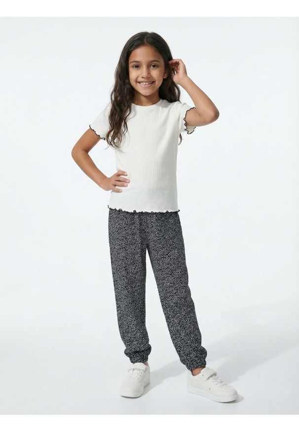 Sinsay - Spodnie loose ze wzorem - granatowy. Kolor: niebieski