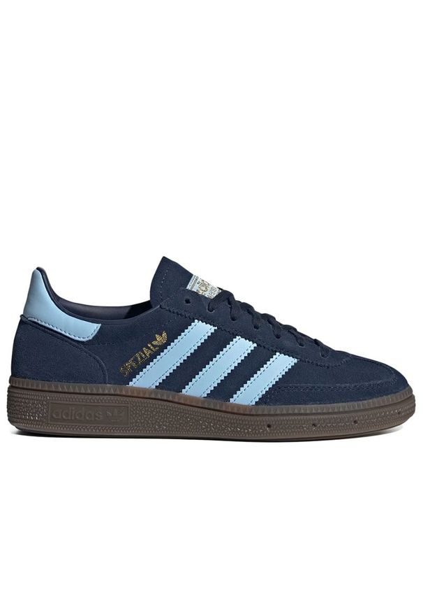 Adidas - Buty młodzieżowe adidas Handball Spezial J IH8011 - granatowe. Okazja: na co dzień. Zapięcie: sznurówki. Kolor: niebieski. Materiał: zamsz, guma, skóra. Szerokość cholewki: normalna. Sport: piłka ręczna
