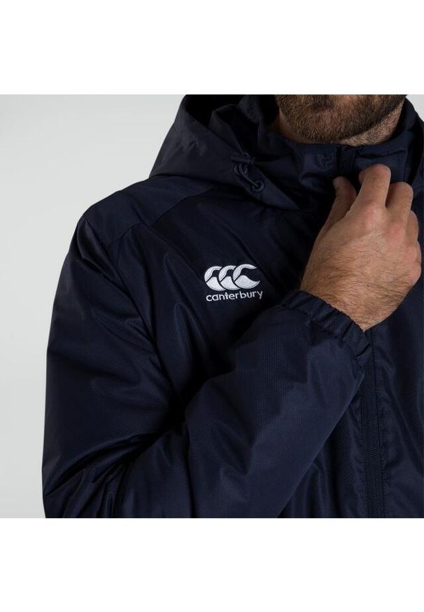 CANTERBURY - Kurtka wodoodporna Canterbury Club Vaposhield Stadium. Kolor: niebieski. Materiał: softshell