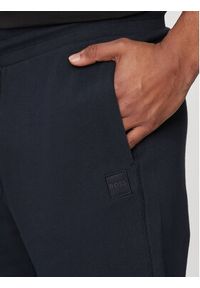 BOSS - Boss Spodnie dresowe Sestart 50509303 Granatowy Regular Fit. Kolor: niebieski. Materiał: bawełna