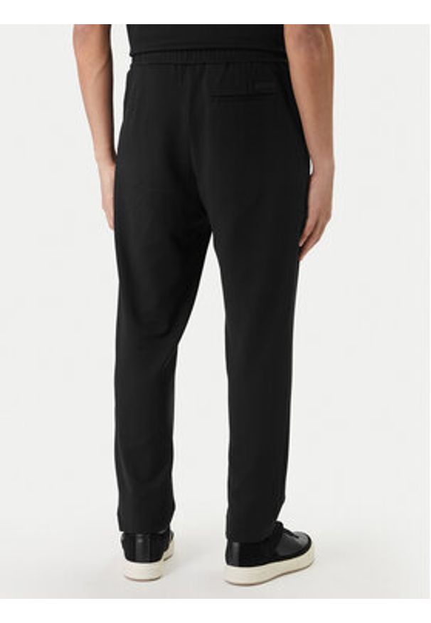 Calvin Klein Spodnie materiałowe LV04LF607G Czarny Tapered Fit. Kolor: czarny. Materiał: wiskoza
