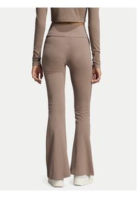 Adidas - adidas Legginsy Essentials JC9023 Beżowy Flare Fit. Kolor: beżowy. Materiał: bawełna #3