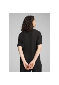Puma - Damska koszulka ESS TAPE o luźnym kroju PUMA Black. Kolor: czarny