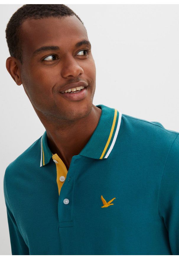 bonprix - Koszulka polo (2 szt.) z czystej bawełny organicznej. Typ kołnierza: polo. Kolor: niebieski. Materiał: bawełna. Długość rękawa: długi rękaw. Długość: długie. Wzór: haft