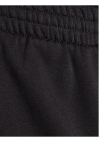 Adidas - adidas Spodnie dresowe Essentials JF3567 Czarny Loose Fit. Kolor: czarny. Materiał: bawełna #4