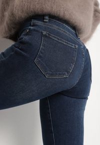 Born2be - Niebieskie Klasyczne Jeansy Skinny z Regularnym Stanem Rastina. Okazja: na spotkanie biznesowe, do pracy, na co dzień. Kolor: niebieski. Styl: klasyczny #5