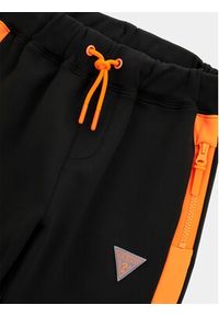 Guess Spodnie dresowe L4RQ14 KB212 Czarny Relaxed Fit. Kolor: czarny. Materiał: syntetyk #2