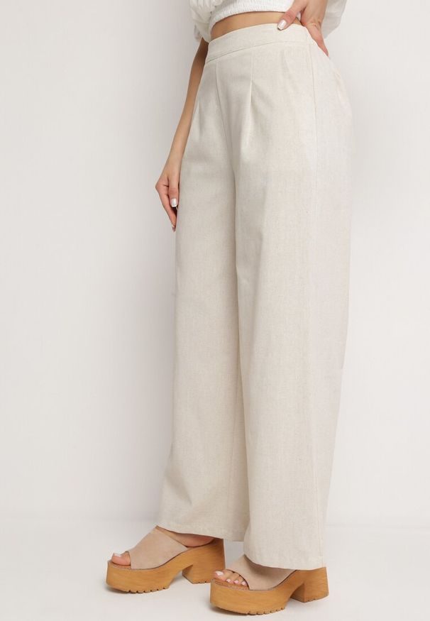 Born2be - Beżowe Szerokie Spodnie z Gumką w Talii z Lnem Araniells. Kolor: beżowy. Materiał: len. Sezon: lato