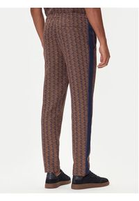 Lacoste Spodnie dresowe XH1440 Brązowy Regular Fit. Kolor: brązowy. Materiał: syntetyk #10