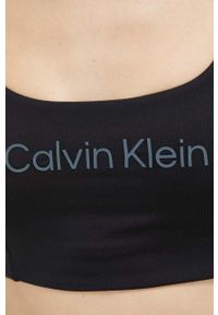 Calvin Klein Performance biustonosz sportowy Essentials kolor czarny. Kolor: czarny. Materiał: skóra. Sport: fitness, taniec #4