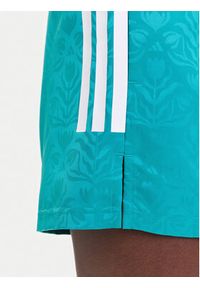 Adidas - adidas Szorty sportowe Tiro x Common Goal JL9208 Turkusowy Loose Fit. Kolor: turkusowy. Materiał: syntetyk