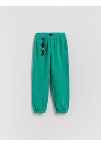 Reserved - Bawełniane spodnie jogger - miętowy. Kolor: miętowy. Materiał: bawełna. Wzór: gładki #1