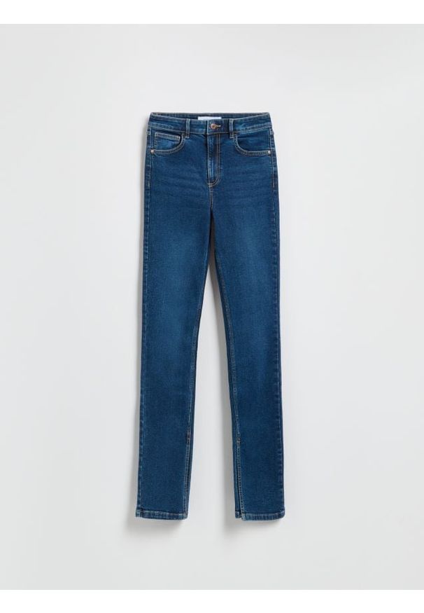 Reserved - Jeansy slim fit z rozcięciem - granatowy. Kolor: niebieski